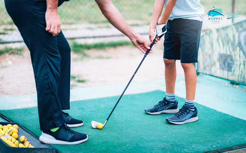 A Child Interested In Learning Golf