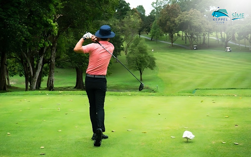 Asian Man Golfing