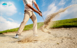 Golfers-Hit-The-Ball-In-The-Sand