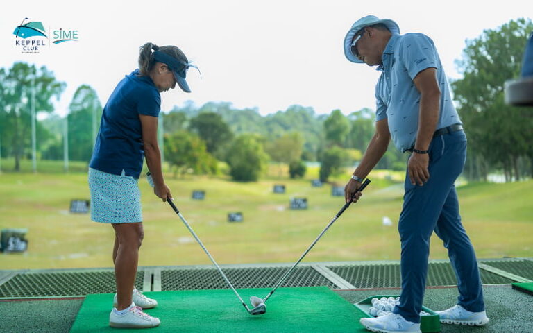 Executive receiving private golf lesson for a mental reset